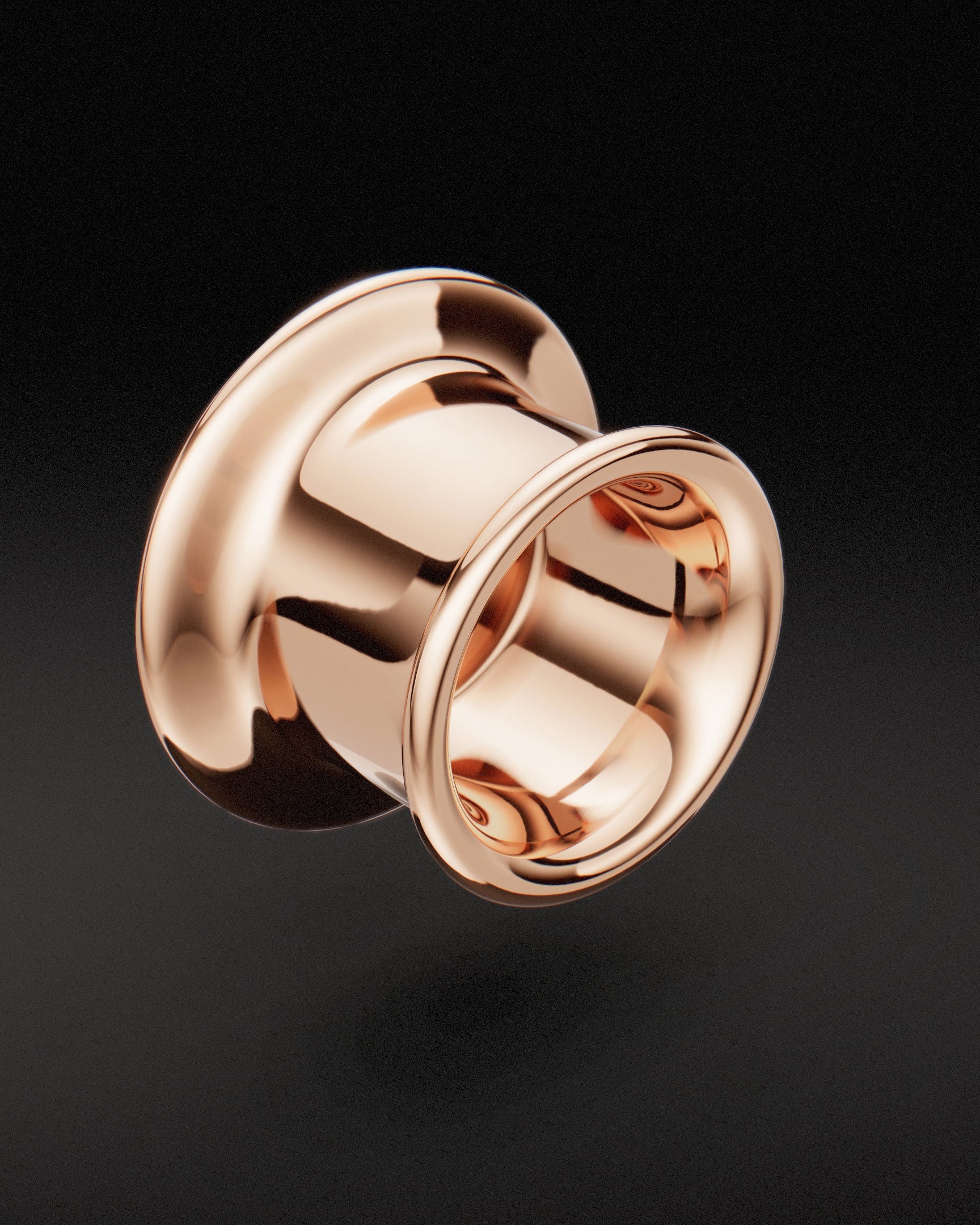 Rose gold Mayan flare ear tunnel, rear view showing back flare